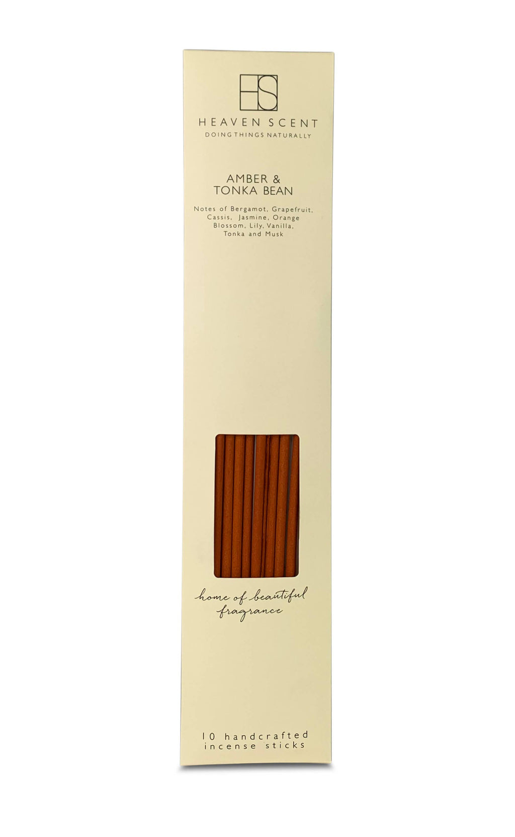 Heaven Scent Amber & Tonka Bean incense stick box, featuring a tall cream-colored packaging sleeve with a window displaying the brown wooden incense sticks inside.
