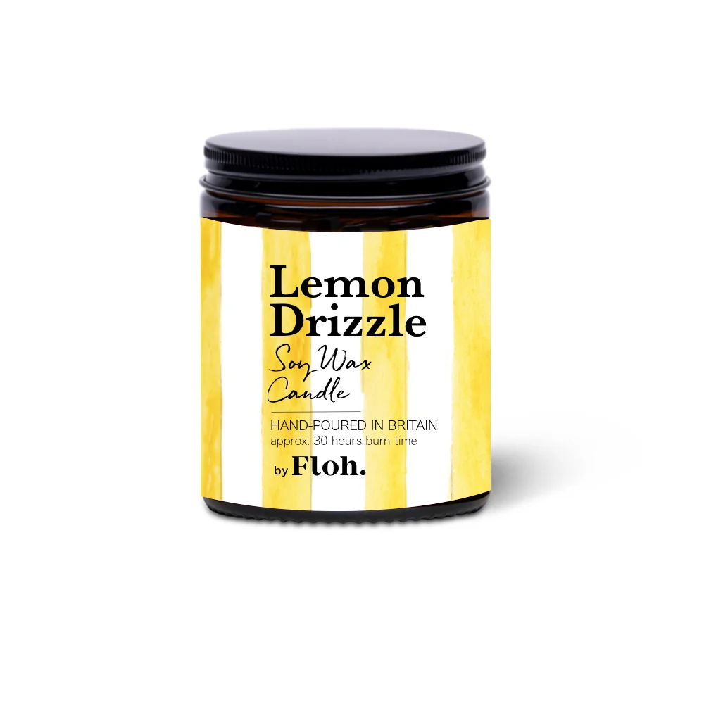 Lemon Drizzle soy wax candle in a yellow and black container on a white background