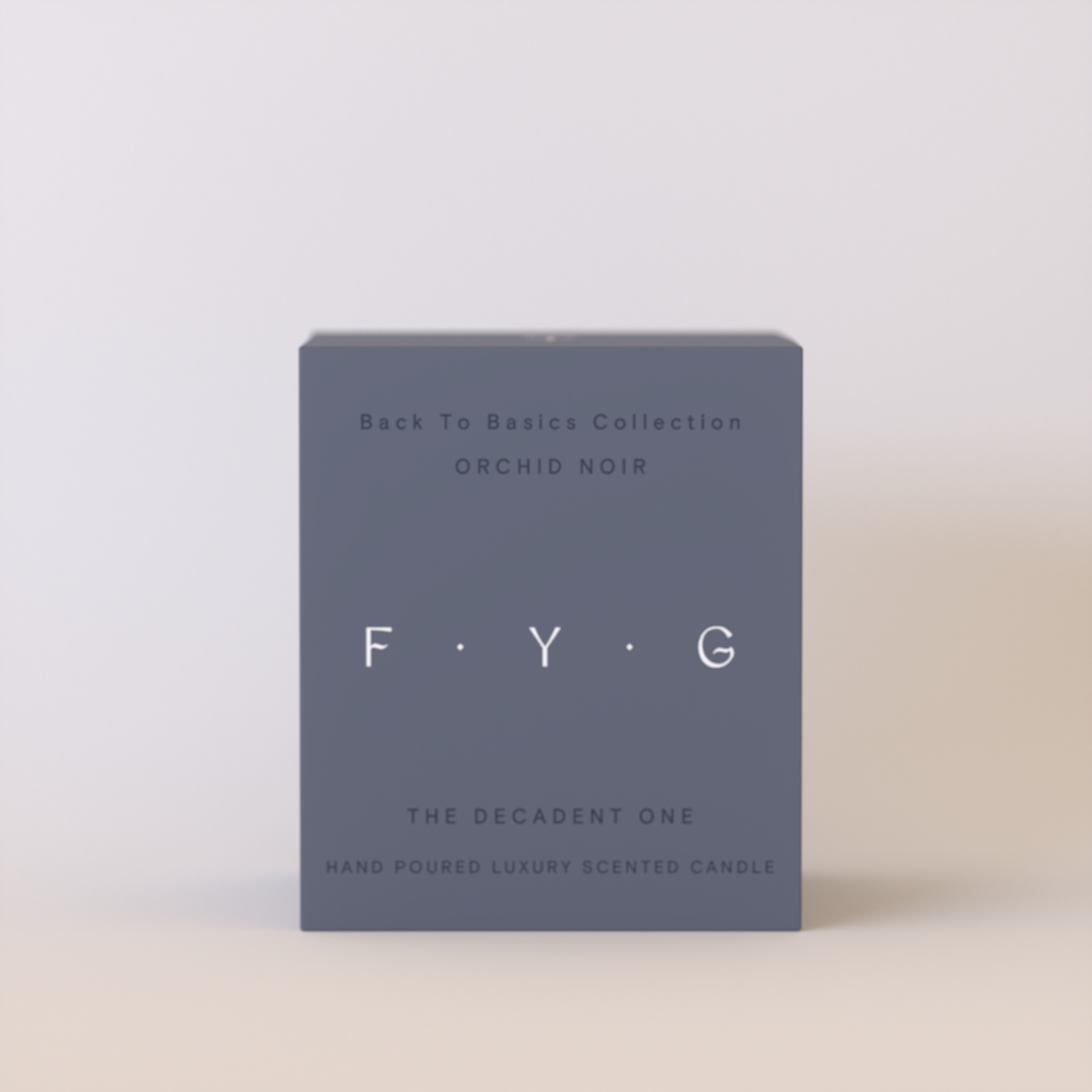 A rectangular product box for a luxury scented candle, featuring a matte slate blue-gray finish with white text. The box displays the brand 'F.
