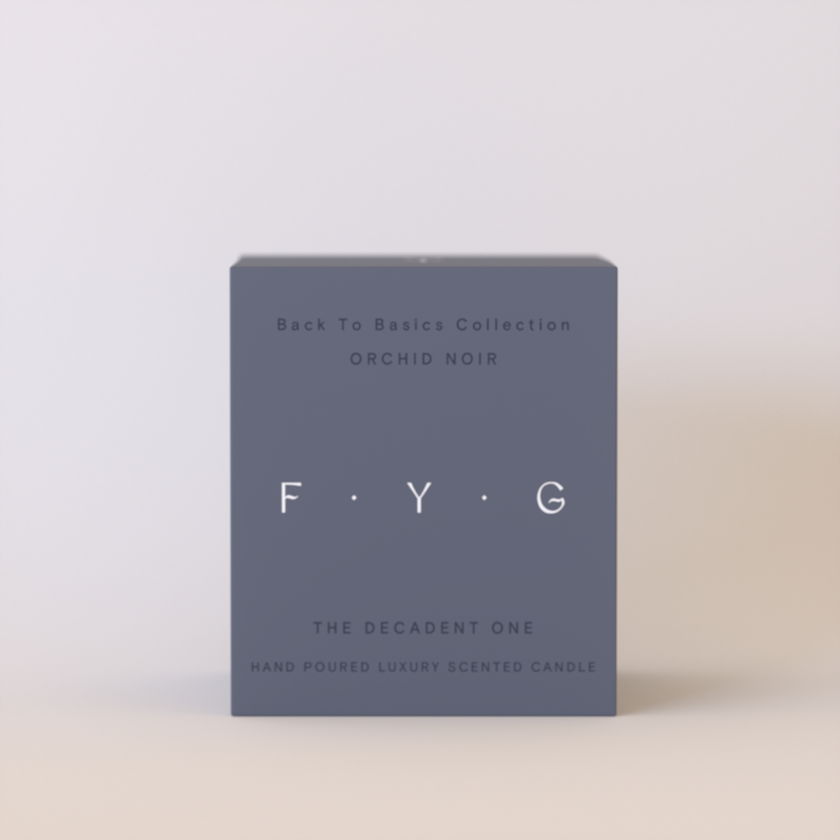 A rectangular product box for a luxury scented candle, featuring a matte slate blue-gray finish with white text. The box displays the brand 'F.