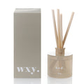 Diffuser with reeds and packaging labeled 'WXY' on a white background