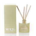 WXY diffuser bottle with wooden sticks and packaging on a white background