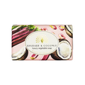 A rectangular bar of soap wrapped in pink paper featuring an illustration of rhubarb stalks, coconut halves, and a central oval label that reads 'RHUBARB & COCONUT luxury vegetable soap'. - The Fig House