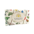 A rectangular bar of Gardeners luxury vegetable soap by The English Soap Company, wrapped in an off-white paper featuring colorful botanical illustrations of flowers, leaves, butterflies, and a dragonfly, with a gold circular logo in the center. - The Fig House