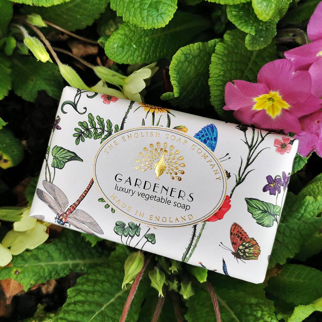 Soap bar with botanical design and 'Gardeners' branding on a green leafy background - The Fig House