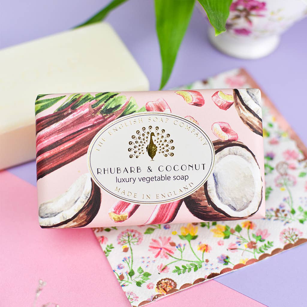 Soap bar with rhubarb and coconut design on a colorful background - The Fig House