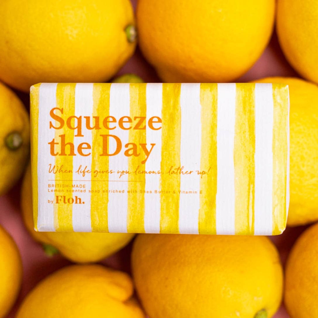 Bar of soap with 'Squeeze the Day' text surrounded by lemons