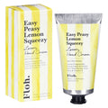 Floh. Easy Peasy Lemon Squeezy Luxury Hand Cream shown in its yellow and white striped packaging box alongside the matching squeeze tube with a black cap.